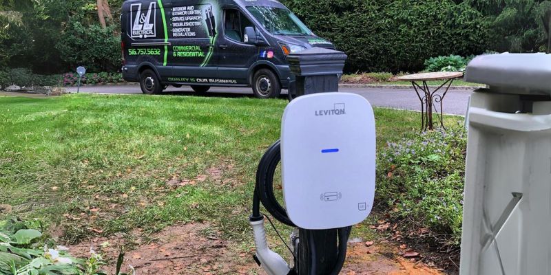 A clean, organized car charger setup in a residential garage ensures safe and efficient home charging for electric vehicles, showcasing attention to detail and quality service.