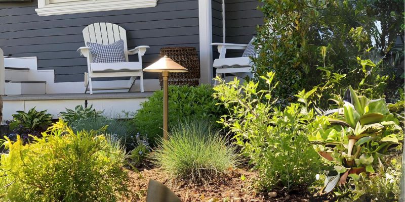 outdoors of a house with chairs and plants
